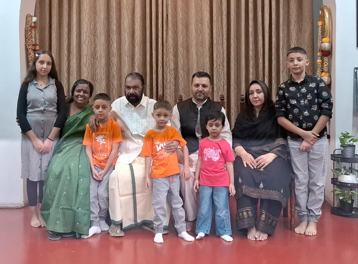 The Afghan family living in Thiruvananthapuram pose for a photograph with General Education Minister V. Sivankutty and his wife R. Parvathy Devi on Sunday: The Afghan family living in Thiruvananthapuram pose for a photograph with General Education Minister V. Sivankutty and his wife R. Parvathy Devi on Sunday: