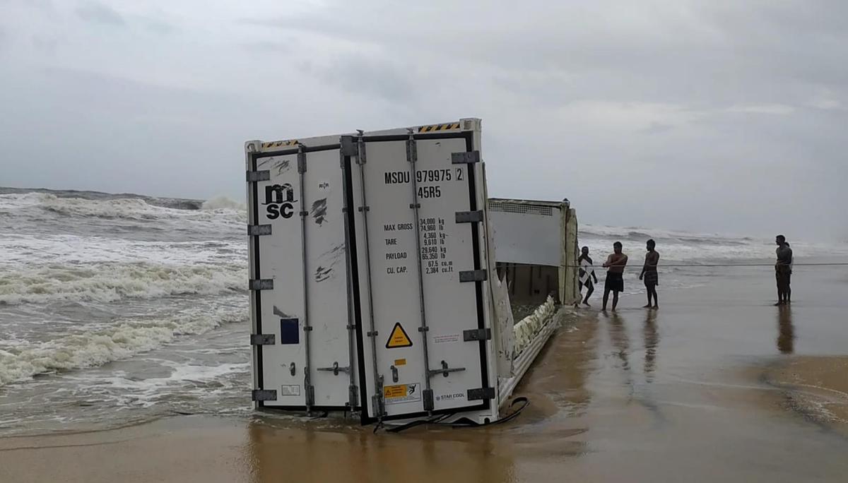 Shipping containers that washed ashore at Anchuthengu beach in Thiruvananthapuram on Tuesday (May 27, 2025).