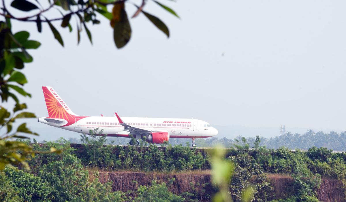 A flight lands on the tabletop runway at the Calicut airport. A flight lands on the tabletop runway at the Calicut airport.