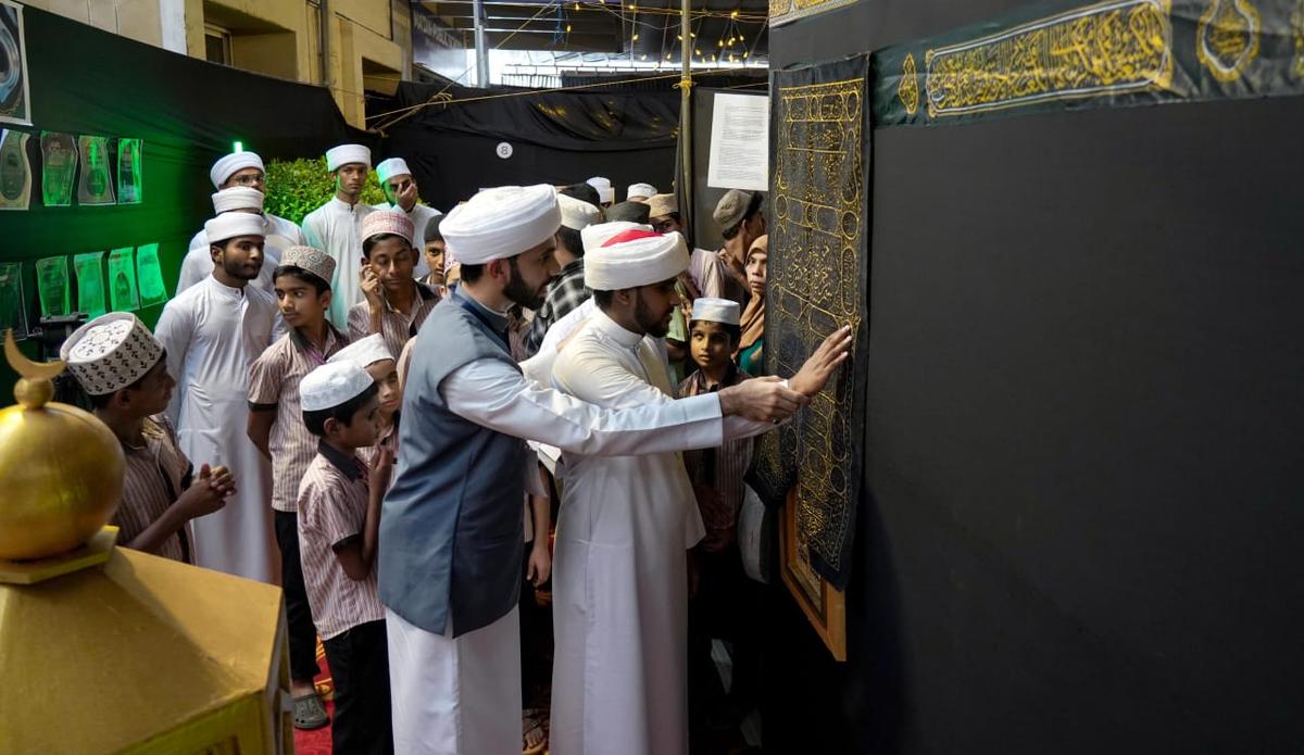 Visually challenged students feeling the Kaaba miniature at the Haramain exhibition on Friday. Visually challenged students feeling the Kaaba miniature at the Haramain exhibition on Friday.
