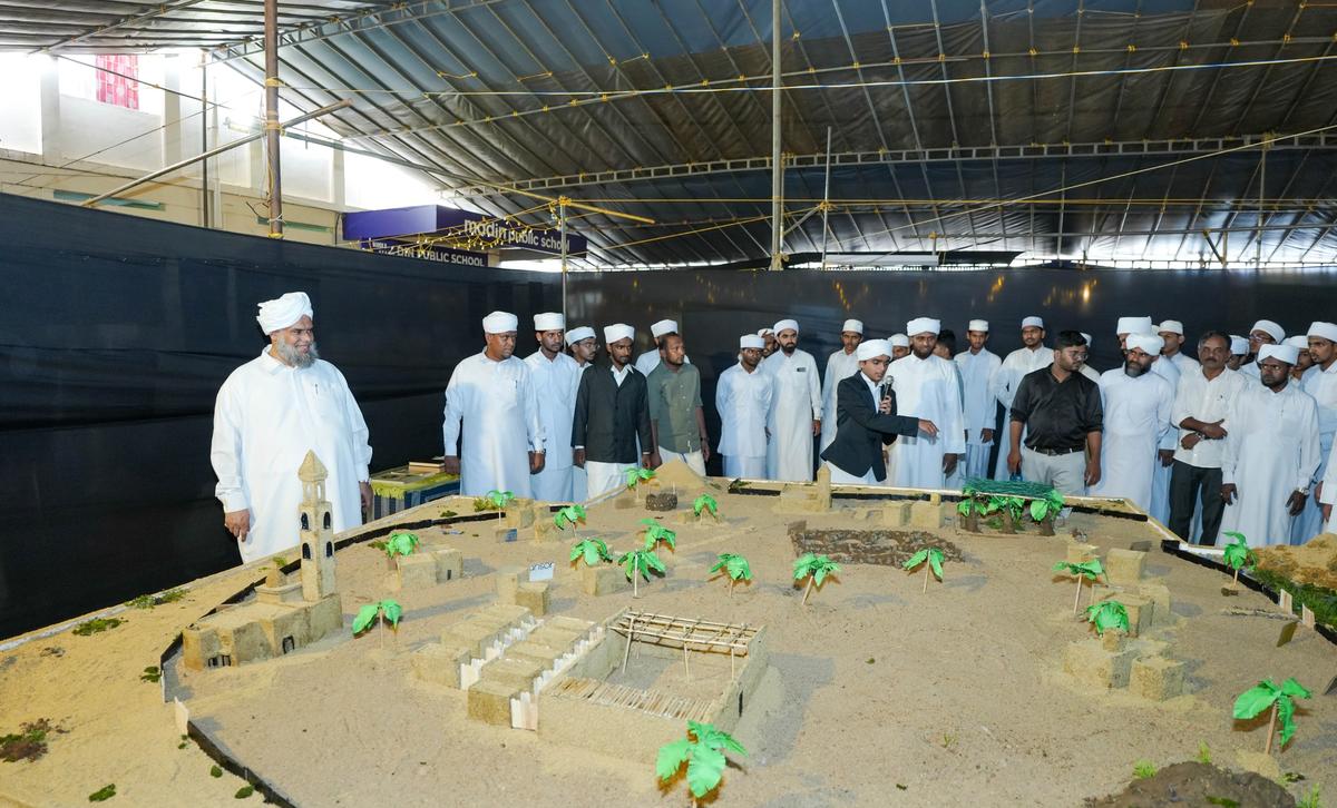 Volunteers explaining the village and housing concept being followed during the time of Prophet Mohammed. Volunteers explaining the village and housing concept being followed during the time of Prophet Mohammed.