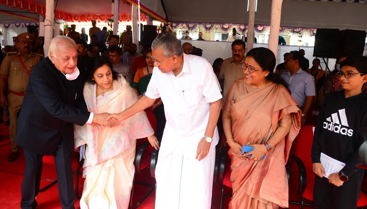 Governor Arif Mohammed Khan greets Prime Minister Pinarayi Vijayan during Republic Day celebrations, in Thiruvananthapuram, on January 26, 2023.