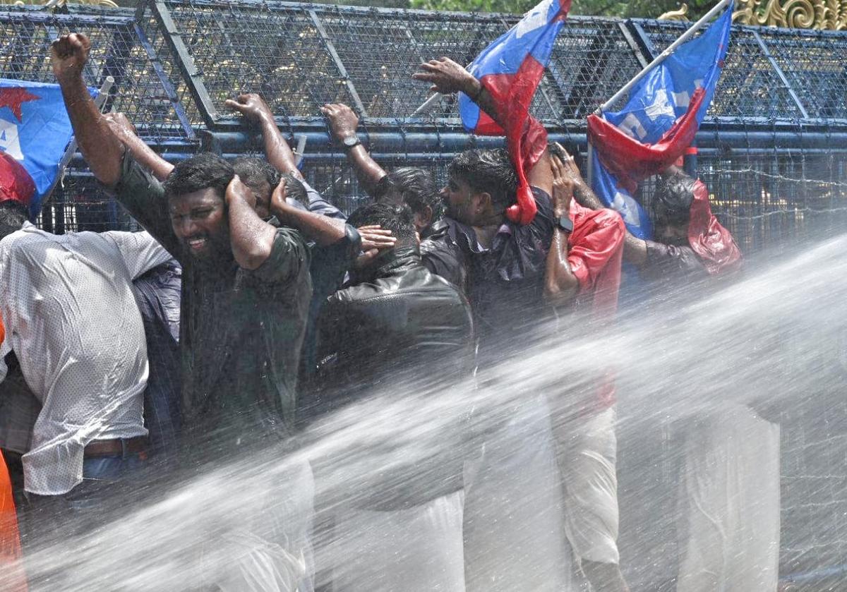 The police using water cannons to disperse All India Youth Federation (AIYF) protesters outside the University of Kerala campus in Thiruvananthapuram on Thursday. The police using water cannons to disperse All India Youth Federation (AIYF) protesters outside the University of Kerala campus in Thiruvananthapuram on Thursday.