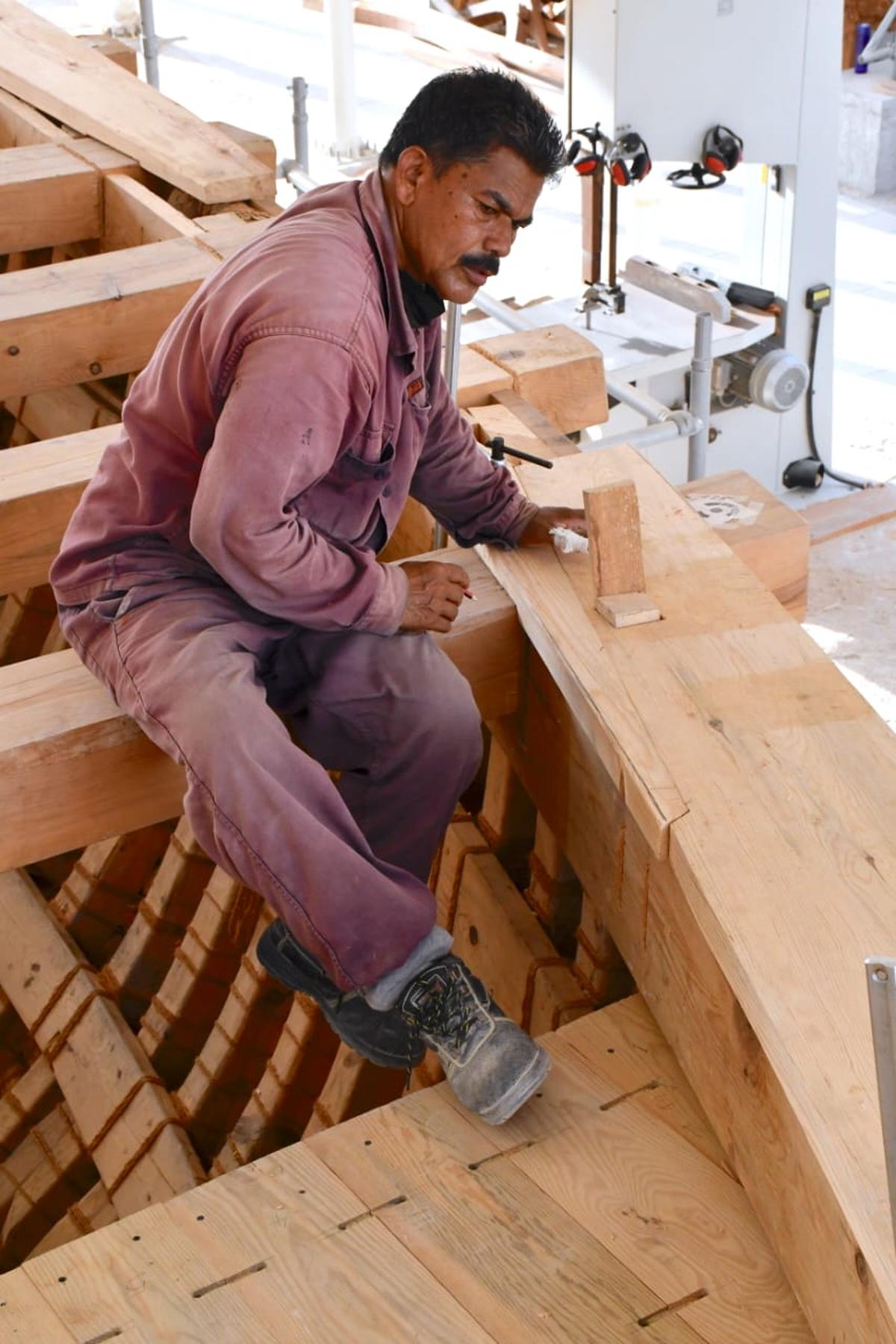 Master shipwright Babu Sankaran at work during the initial days of crafting INSV Kaundinya in Goa. 