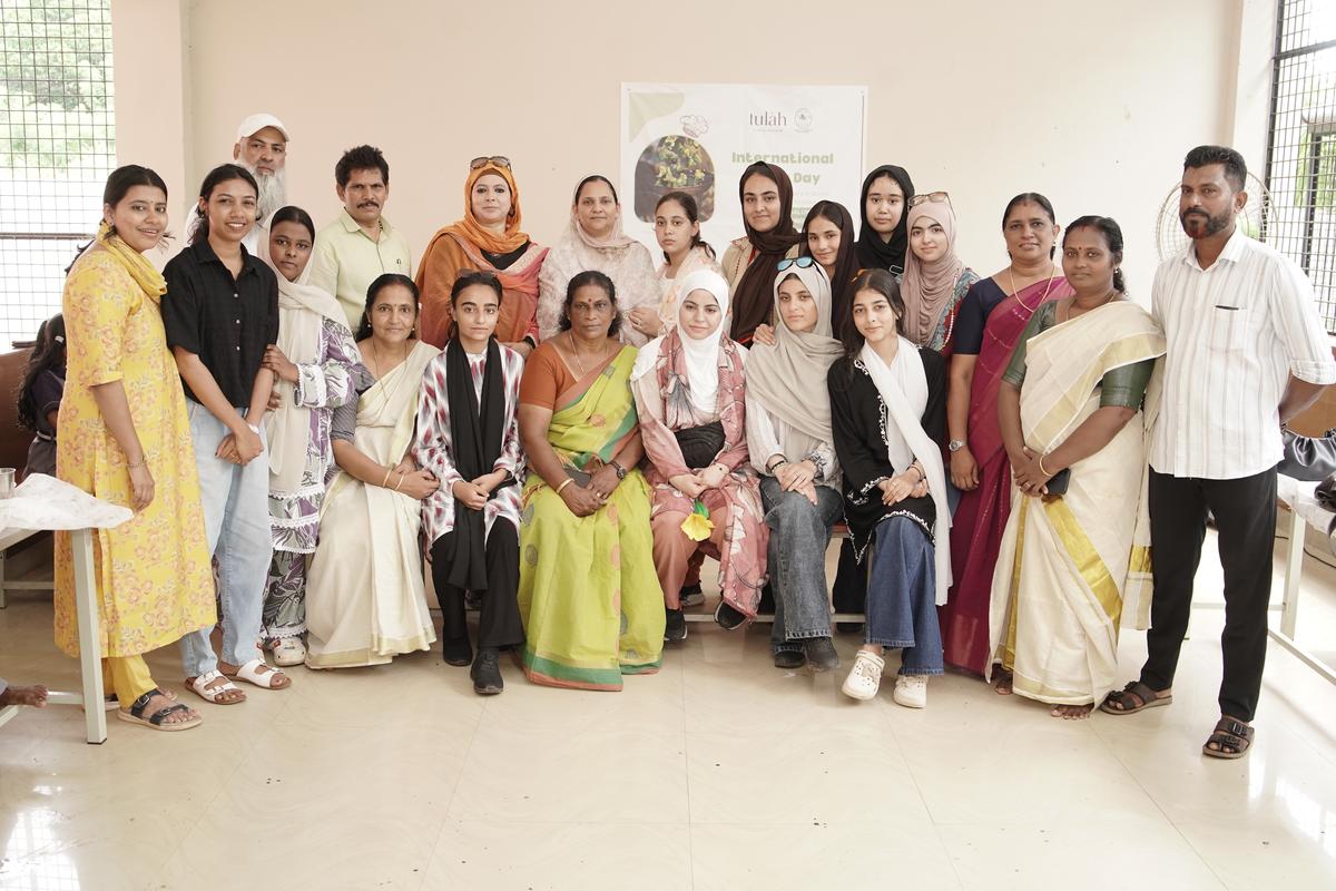 Students and teachers from Government Girls Higher Secondary School, Kothi Bagh, posing for a photo with the teachers of Government Fisheries LP School, Kadalundi Nagaram, on Wednesday.