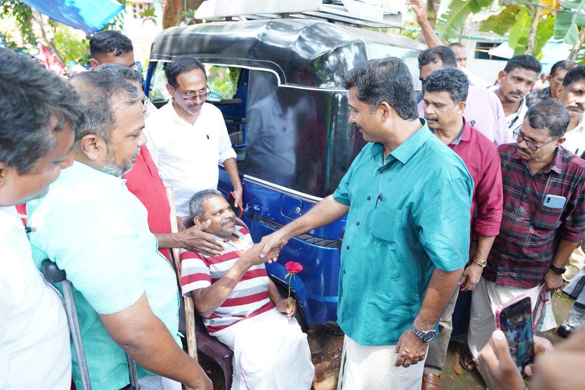 LDF candidate M. Swaraj shaking hands with a man in wheelchair during electioneering in Nilambur on Tuesday. LDF candidate M. Swaraj shaking hands with a man in wheelchair during electioneering in Nilambur on Tuesday.