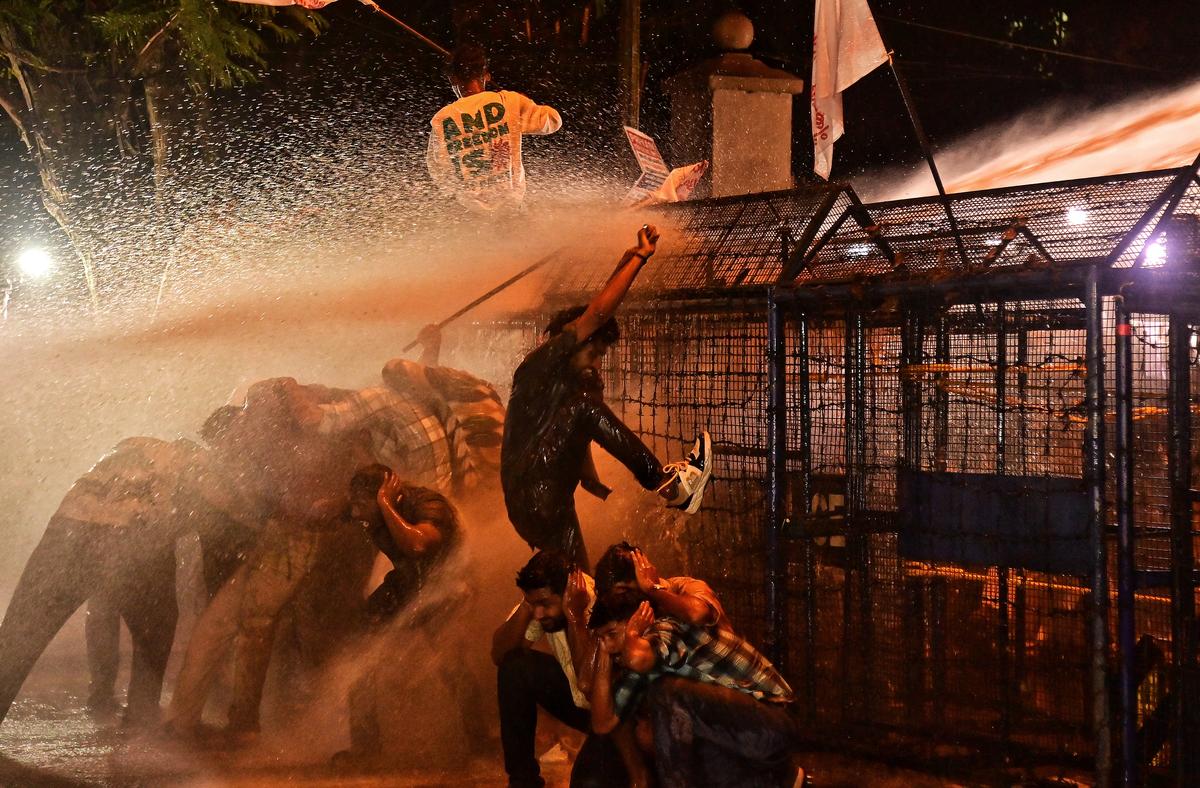 The police use water cannon as Students Federation India activists protest outside Raj Bhavan in Thiruvananthapuram on Wednesday against the suspension of the University of Kerala Registrar.