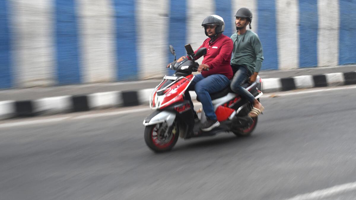 On two wheels and a prayer, bike taxis have bumpy ride