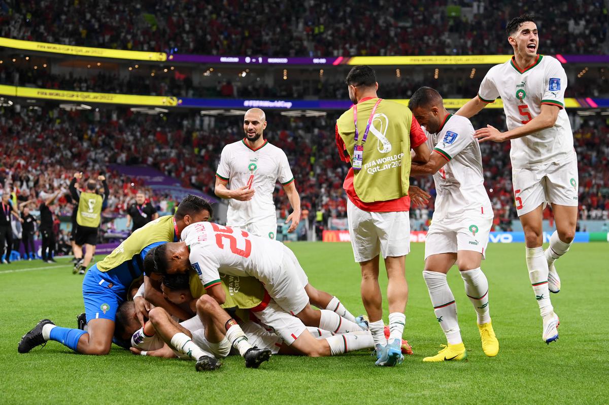 Zakaria Aboukhlal of Morocco celebrates with teammates after scoring their team’s second goal during the FIFA World Cup Qatar 2022 Group F match between Belgium and Morocco at Al Thumama Stadium on November 27, 2022, in Doha, Qatar. 