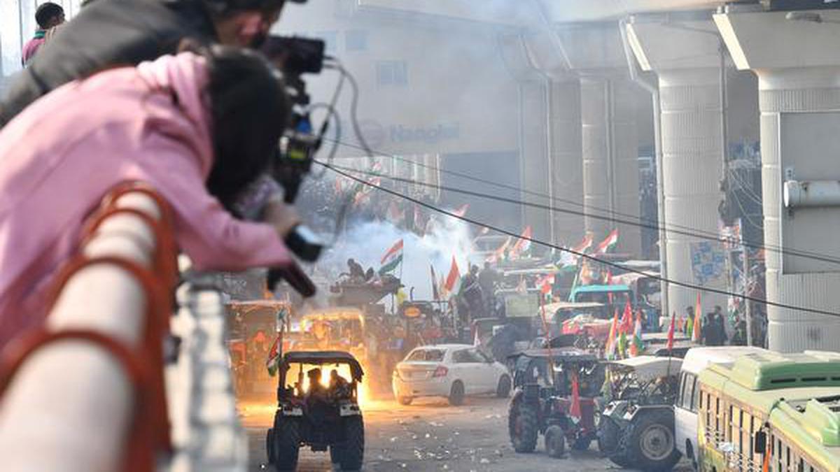 Farmers’ protests | Police withdraw at Nangloi as farmers break through barricades during Republic Day tractor rally