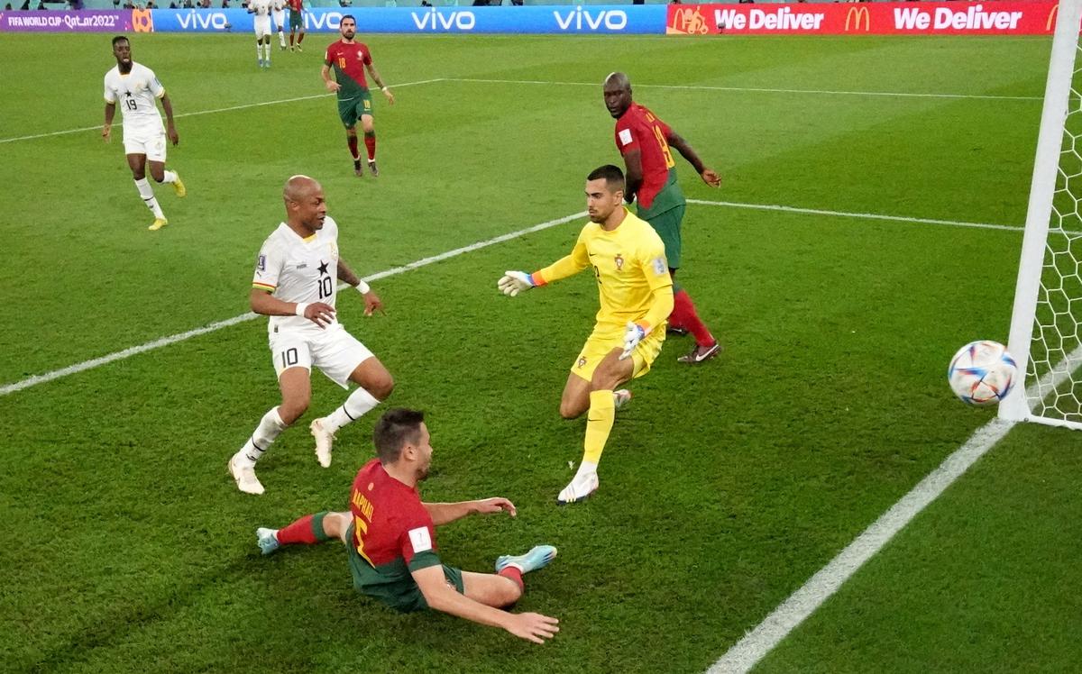 Ghana’s Andre Ayew scores their first goal during the FIFA World Cup Qatar 2022 Group H match between Portugal and Ghana at Stadium 974 on November 24, 2022, in Doha, Qatar.