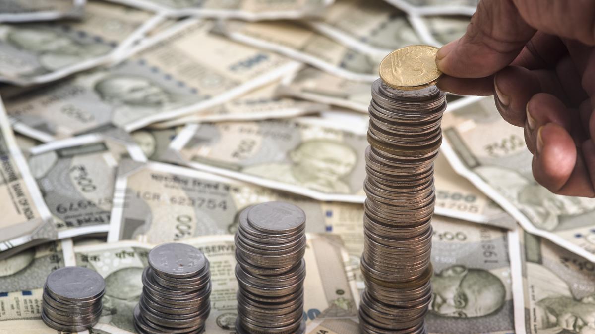 Rupee ends little changed, hemmed in by position unwinding, importer hedging