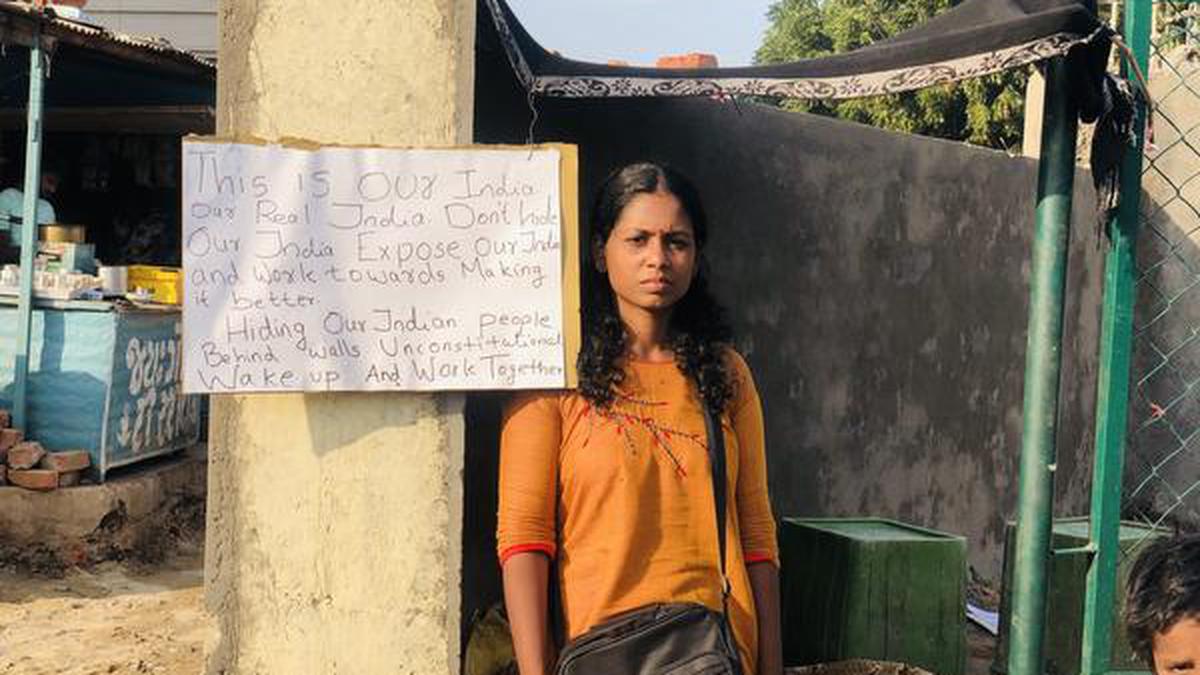 Donald Trump visit to Ahmedabad | Kerala social worker Aswathy Jwala launches hunger strike against wall ‘to hide slums’