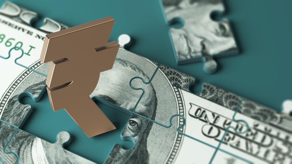Rupee rises 26 paise to close at 85.68 against U.S. dollar