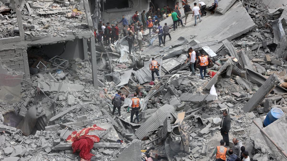 Israeli strike on Gaza apartment building kills at least 23, officials say