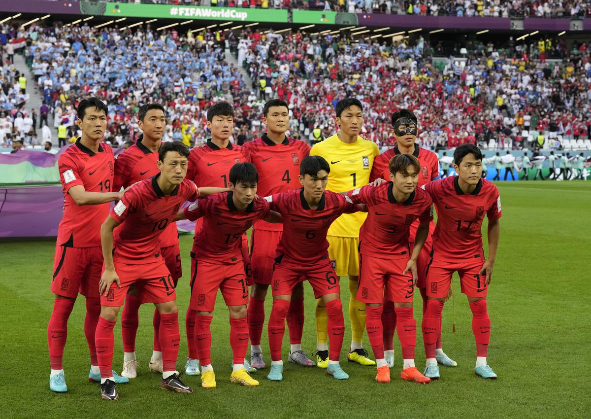 South Korean players pose before the World Cup group H soccer match between Uruguay and South Korea, at the Education City Stadium in Al Rayyan, Qatar, Thursday, Nov.  24, 2022. 