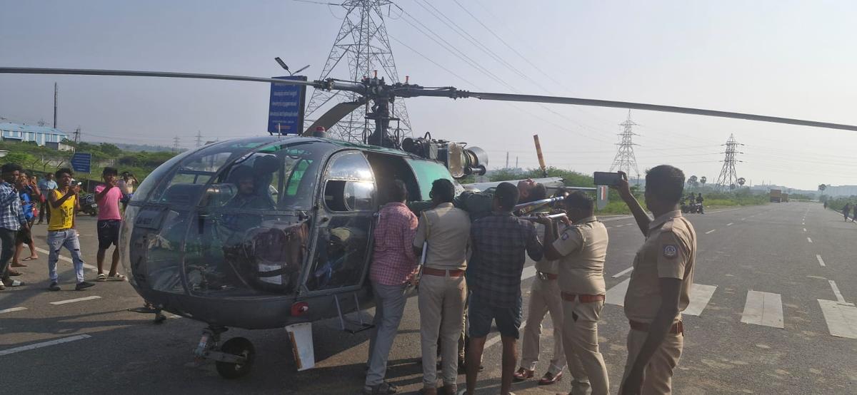 The pilot being helped into an air ambulance on the Thiruporur bypass near Thandalam