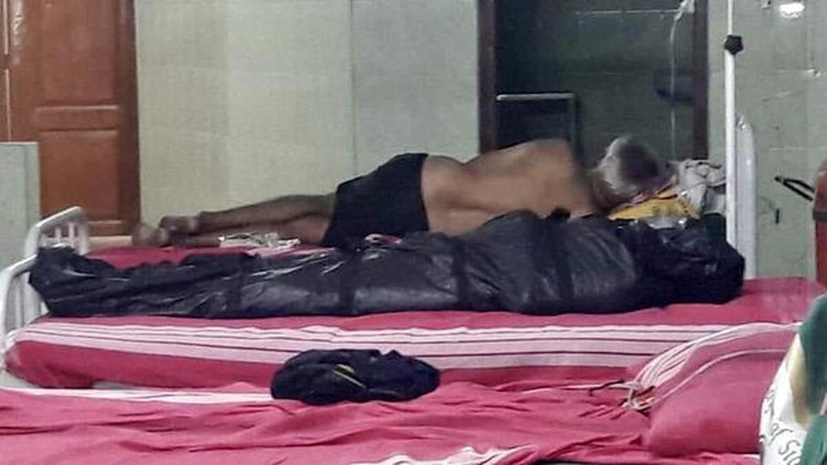 Photograph of body lying next to patient goes viral, stirs up a controversy