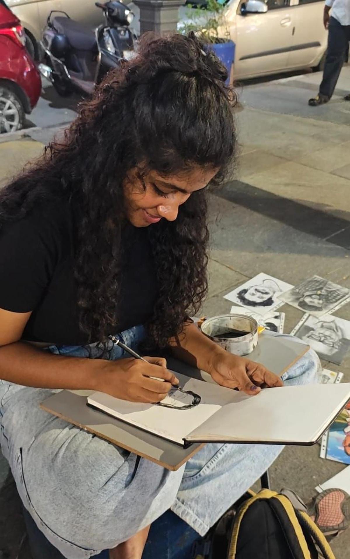 Kaviya, a B.Com graduate and self-taught artist, works in Pondy Bazaar only on weekends Kaviya, a B.Com graduate and self-taught artist, works in Pondy Bazaar only on weekends