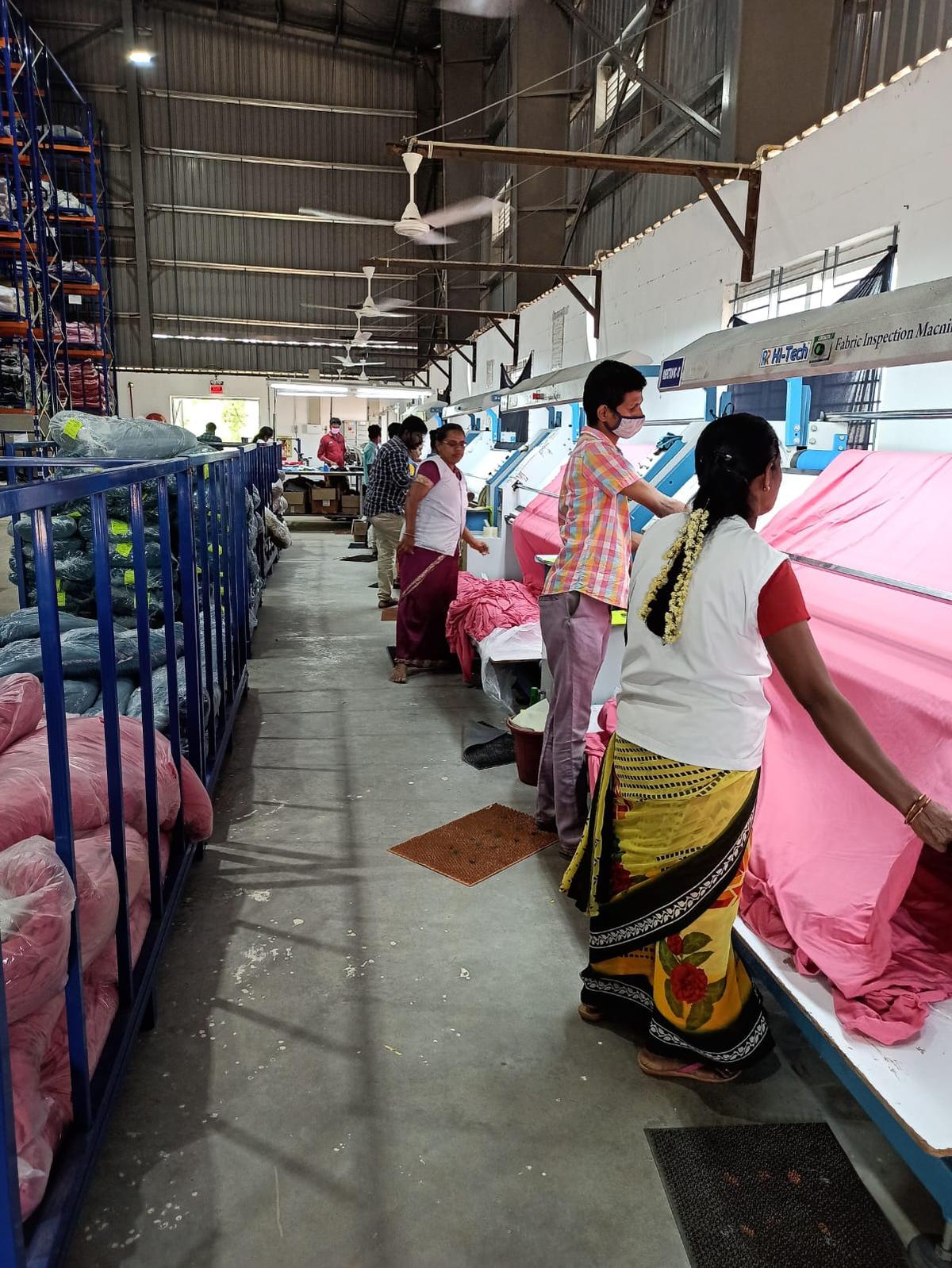 Women workers at a textile factory in Tamil Nadu Women workers at a textile factory in Tamil Nadu