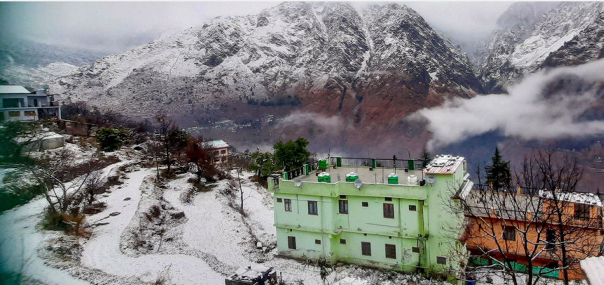 Snow covered mountains in land subsidence-hit Joshimath.