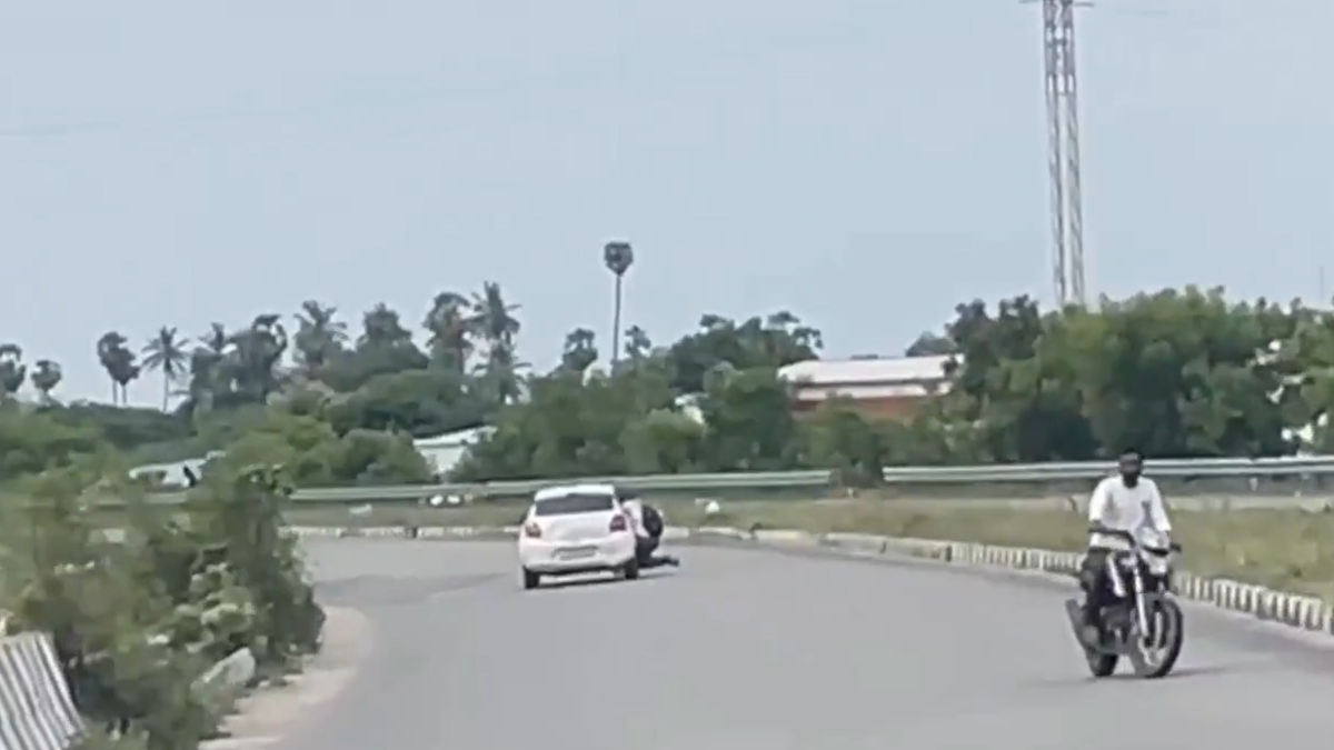 Chennai police constable clings to moving car while chasing absconding accused