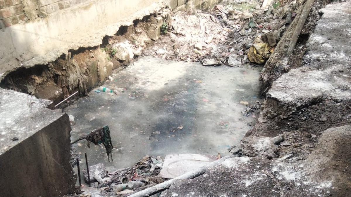 Incomplete stormwater drain in Madipakkam poses threat to motorists, turns open dump site