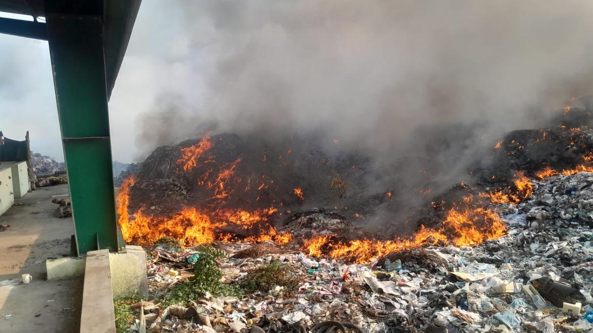 Residents complain of suffocation after open landfill site catches fire near Gudiyatham