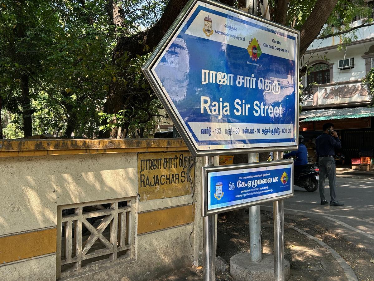 The signboard of Rajachar Street in T. Nagar put up by Chennai Corporation at the intersection with Raghavia Road