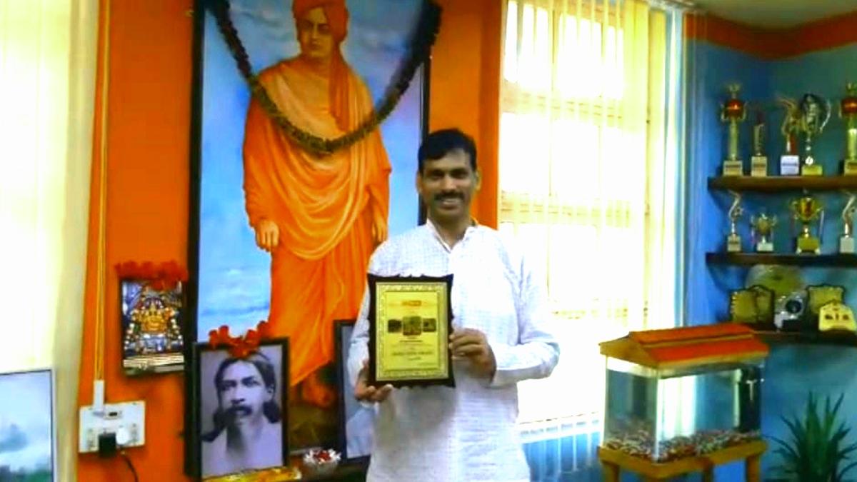 College Principal honoured with Green award for his commitment to environment and greenness