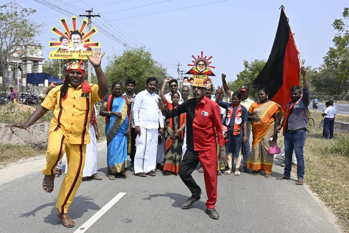 DMK workers celebrating outside the counting centre in Chithode