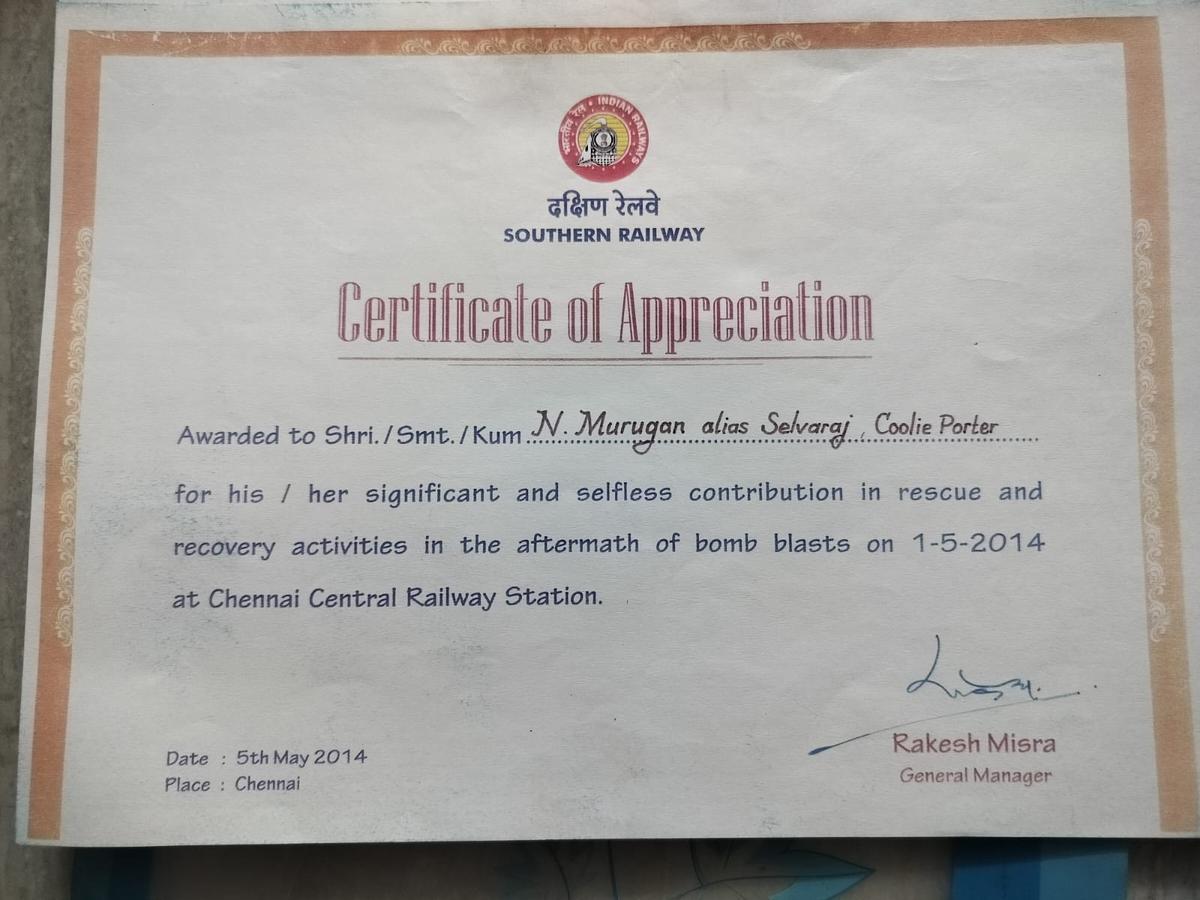 The certificate he received for his service during the 2014 bomb blast 
