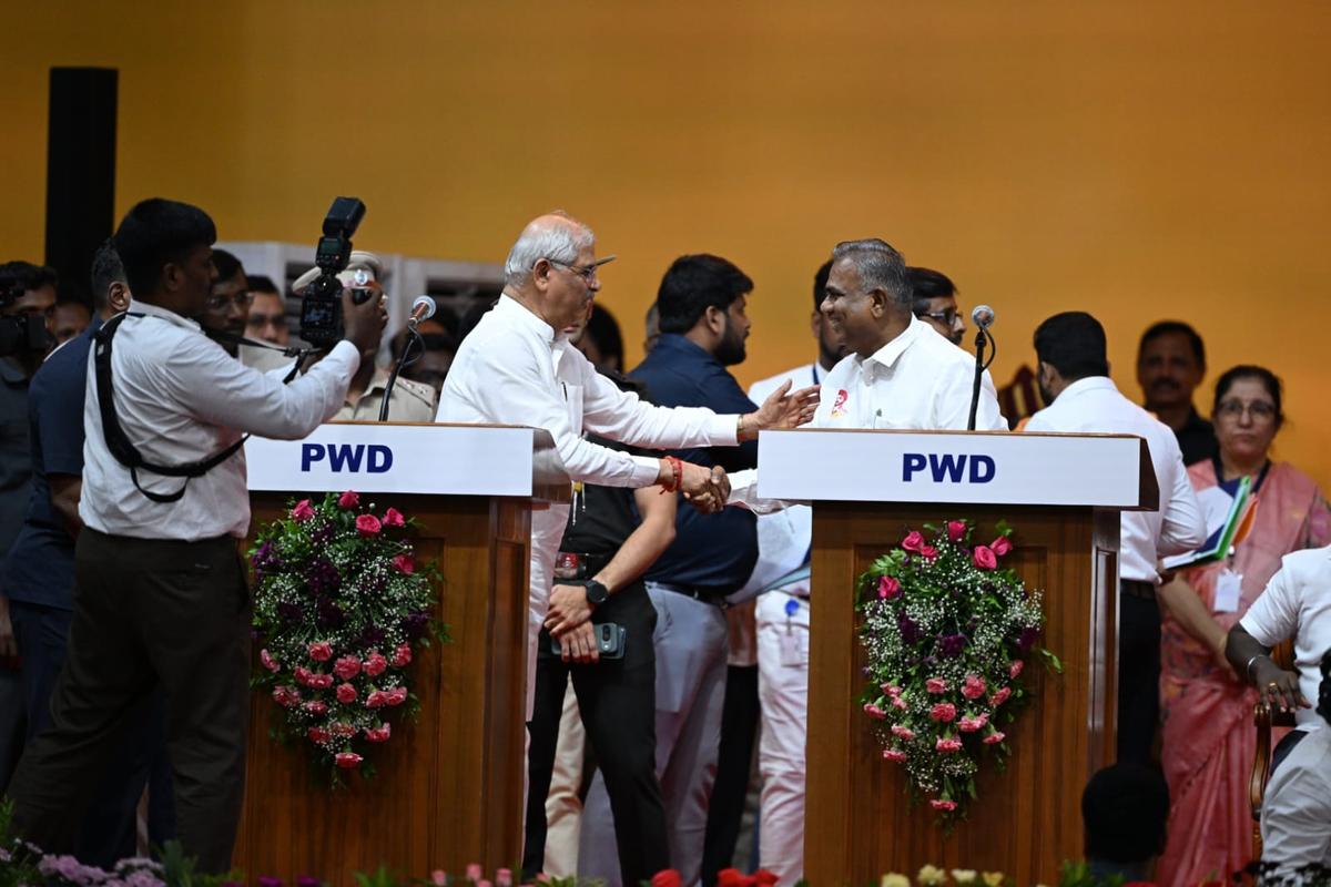 Tamil Nadu Governor Rajendra Vishwanath Arlekar greets ‘Bussy’ N. Anand at the swearing-in ceremony in Chennai on May 10, 2026