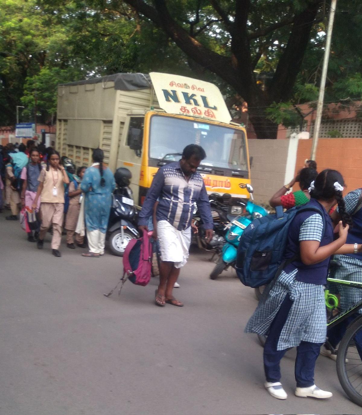  Commercial-vehicles-parked-near-school-at-Ashok-Nagar-inconvenience-students