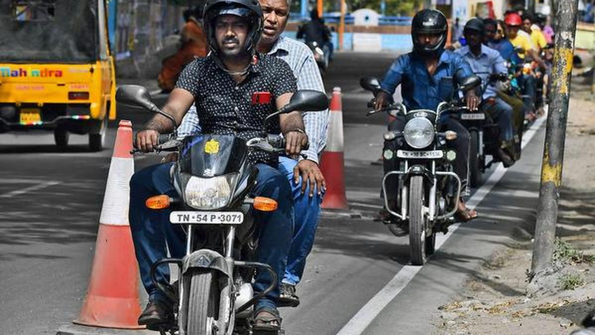 Police offer to twowheeler riders wearing helmet The Hindu