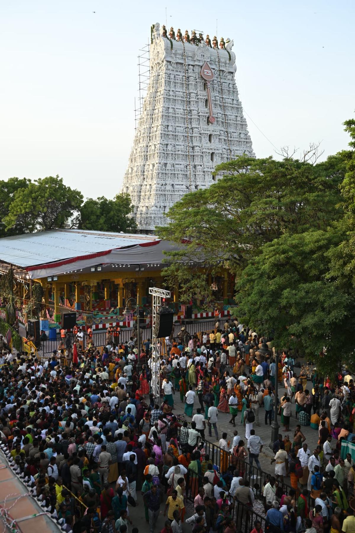 Devotees gather at the Tiruchendur Subramaniya Swamy temple for the kumbabishekam ceremony early on Monday