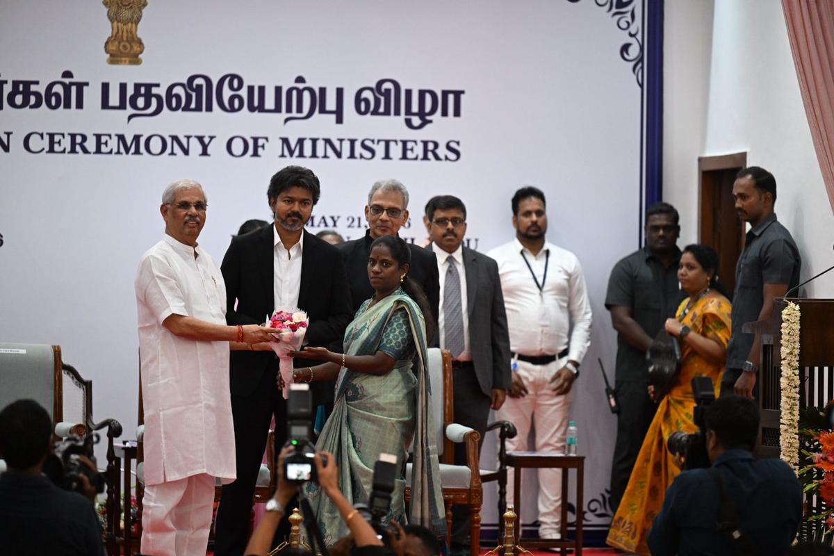 S. Kamali, the TVK MLA from Avinashi constituency with Tamil Nadu Governor Rajendra Vishwanath Arlekar at the Lok Bhavan in Chennai, during the swearing-in of 23 new Ministers on May 21, 2026