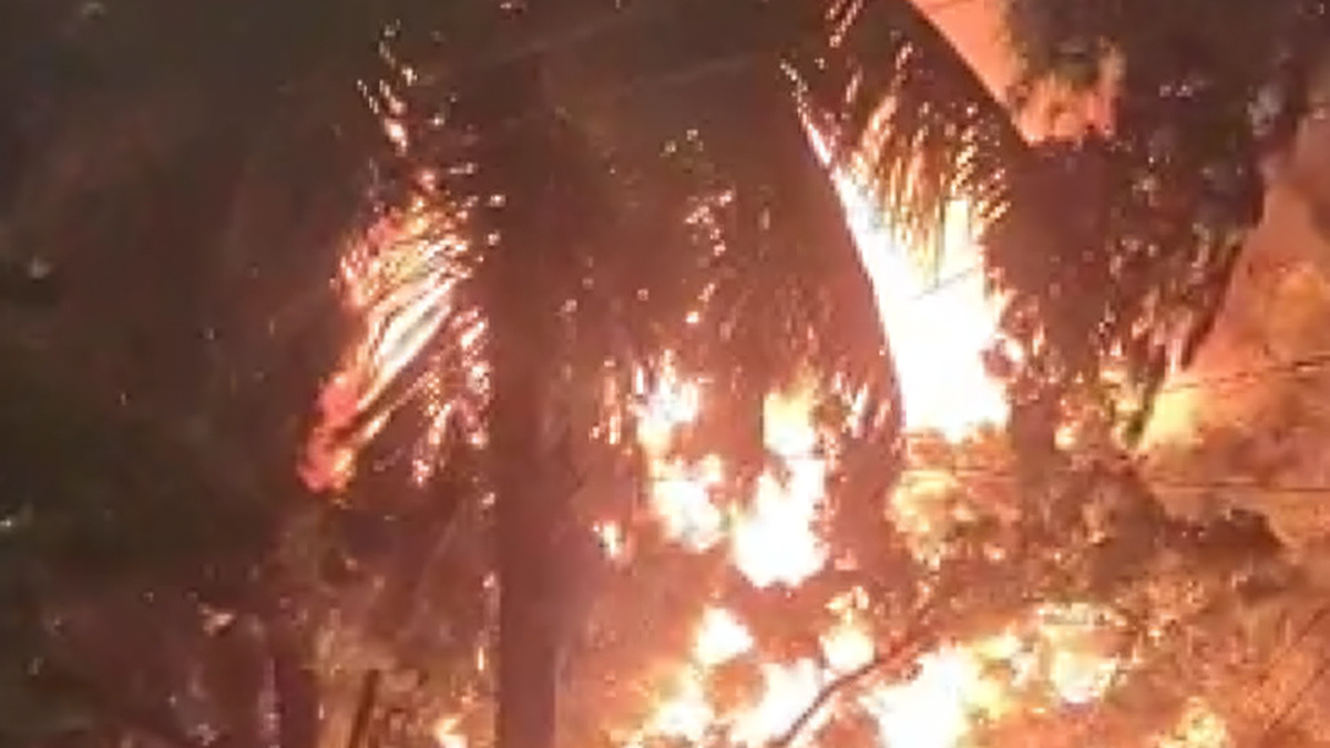 Fire destroys waste materials dumped in a scrap yard in Anna Nagar