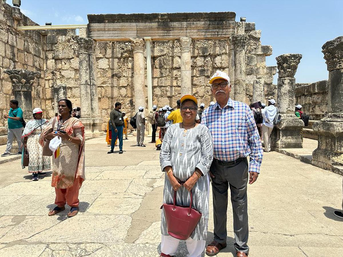 Retired teacher P.S. Sadaguna Raj Wood and his wife in Israel during a pilgrimage in May.