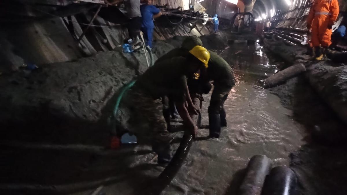 Accumulated silt and metal debris being cleared from the collapsed SLBC tunnel in Domalapenta in Nagarkurnool on 11th day of rescue operation to trace eight missing personnel.