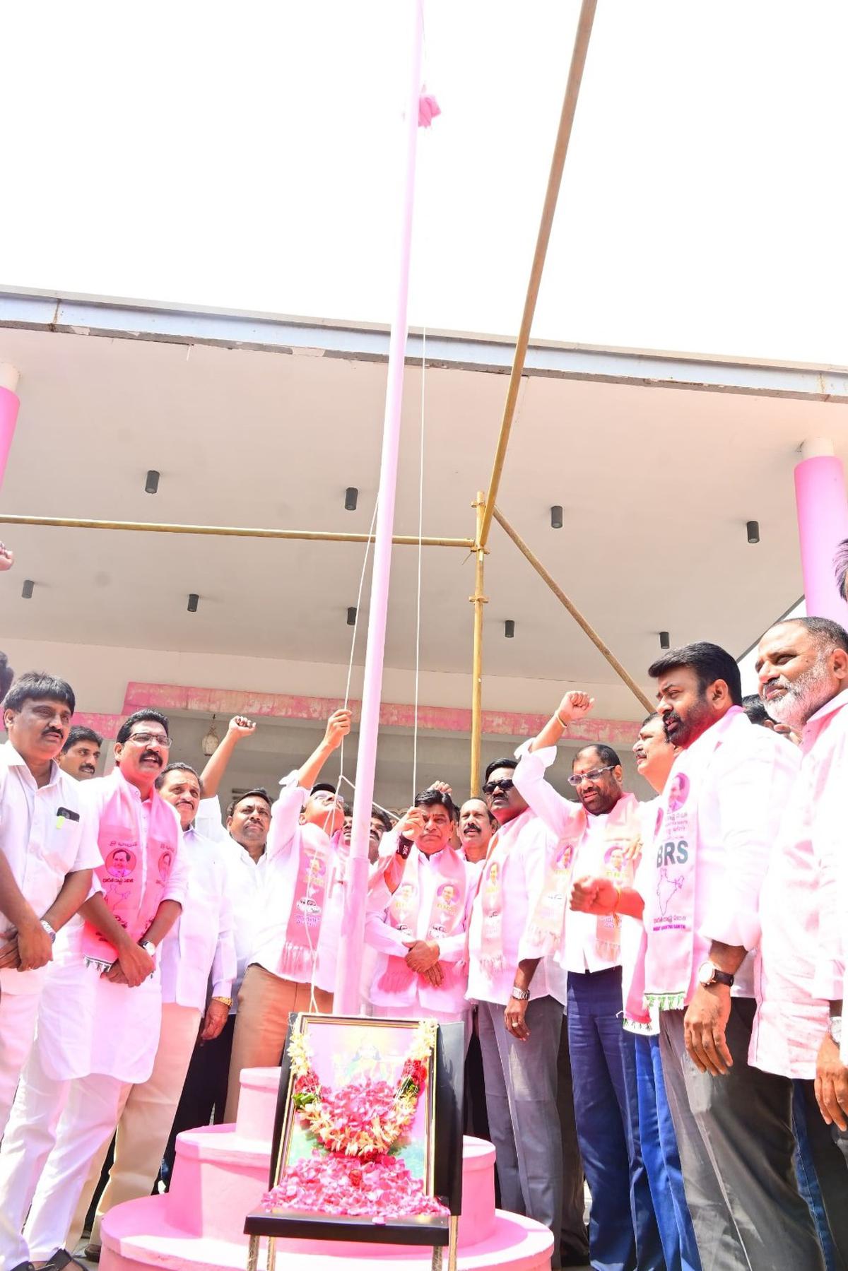 BRS leaders unfurling party flag at Khammam on the party’s foundation day on Saturday.