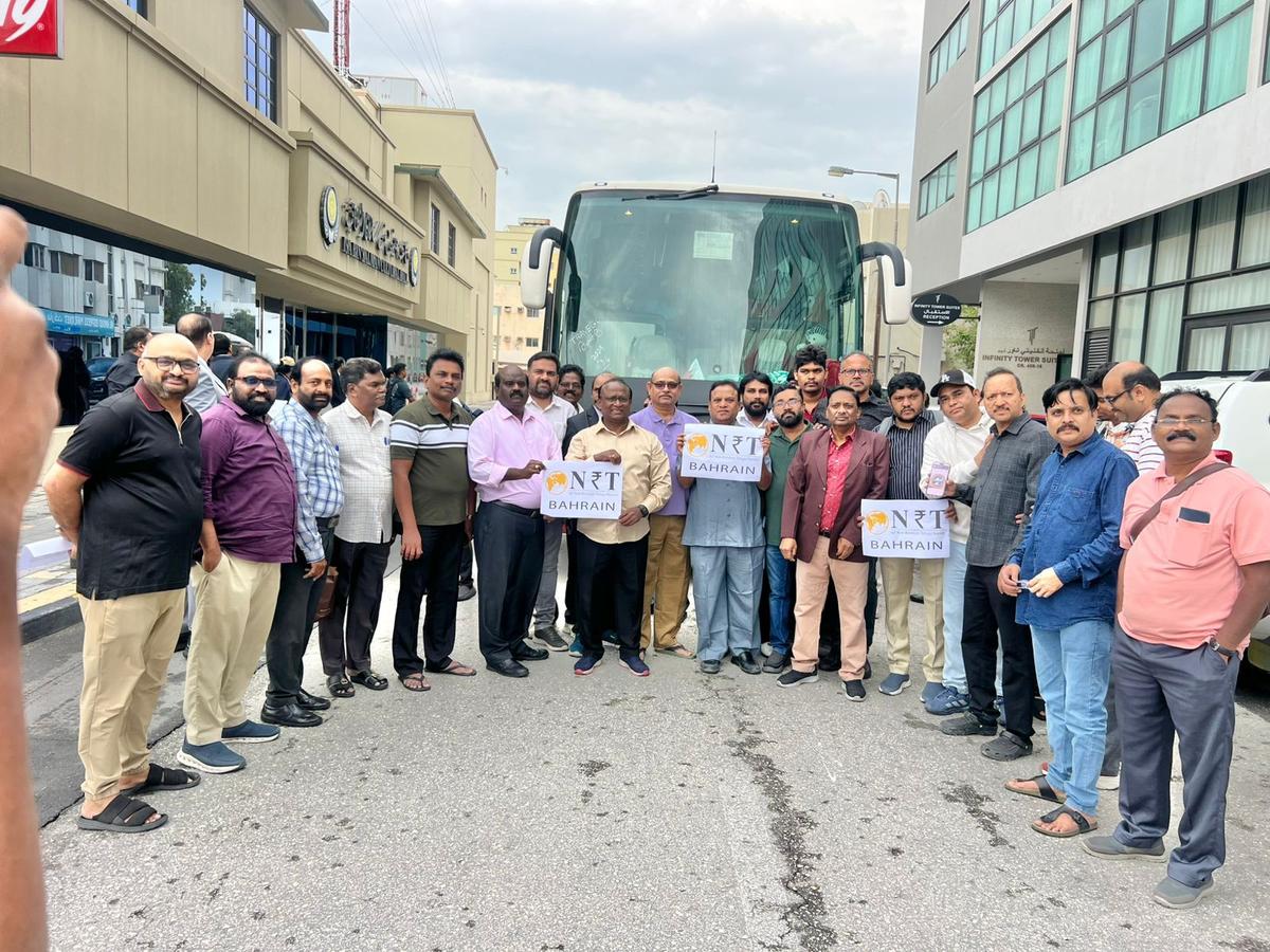Stranded Telugu tourists in Bahrain about to board the bus for their journey by road to Dammam in Saudi Arabia from Manama in Bahrain.