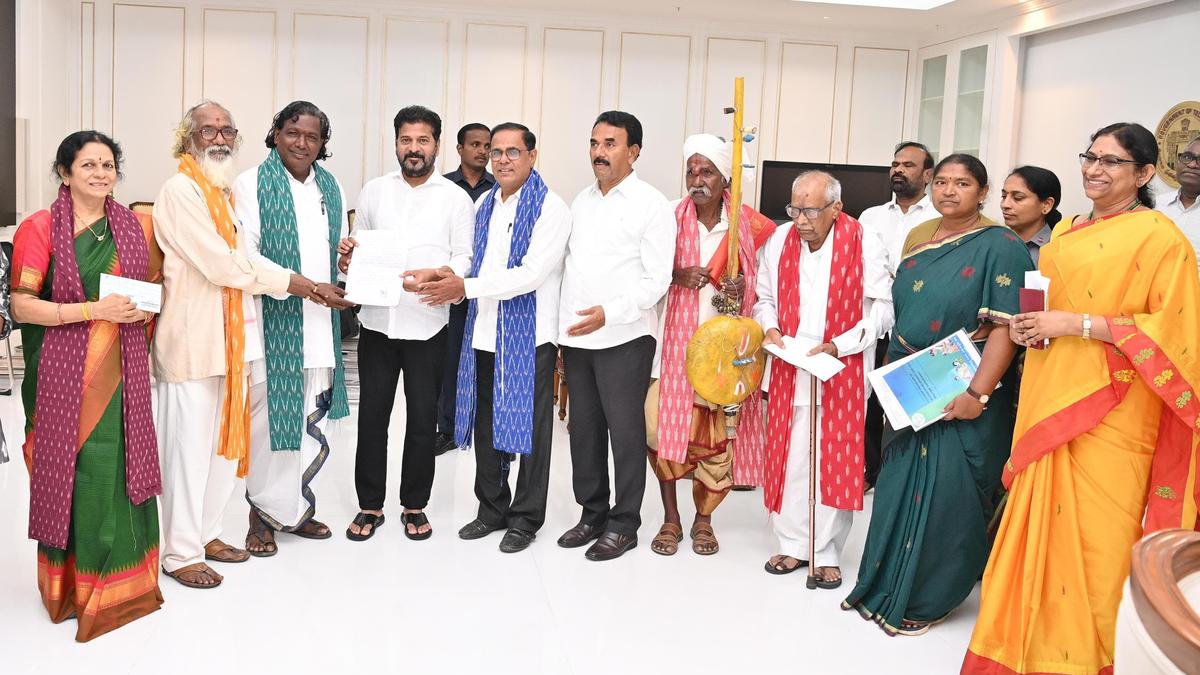 Telangana CM presents cheques to Padma awardees