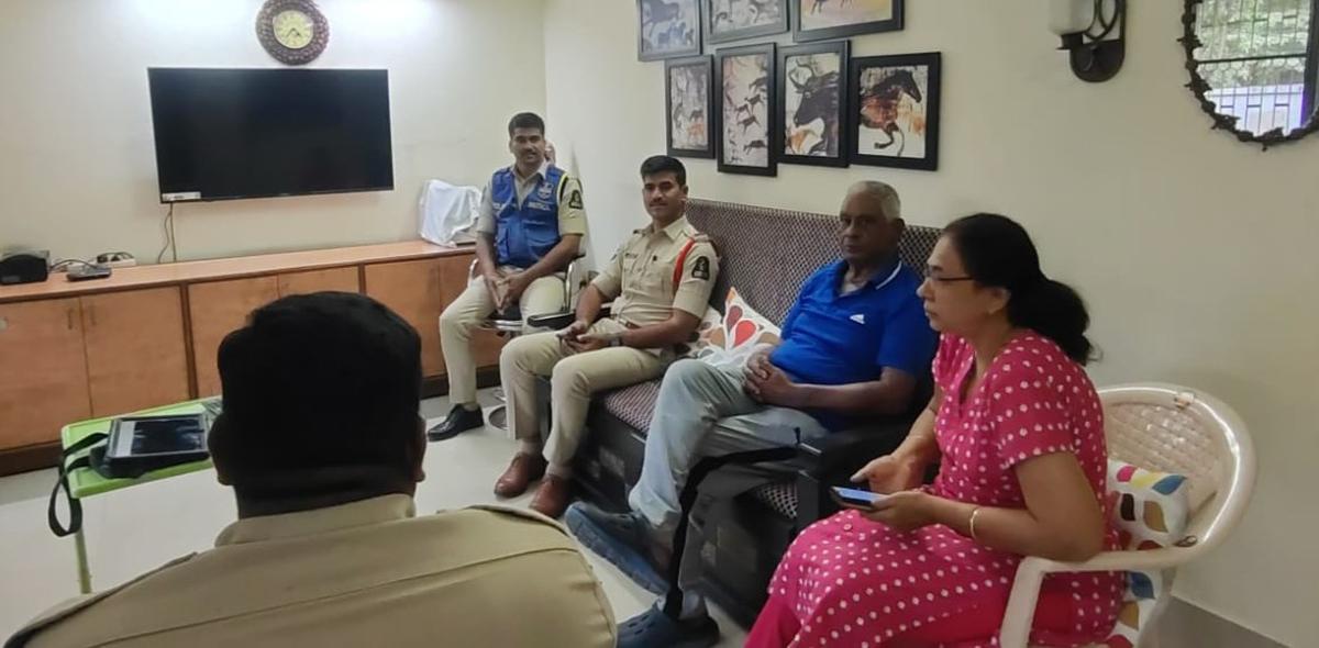 An elderly couple visited by police officers as a part of the drive. An elderly couple visited by police officers as a part of the drive.