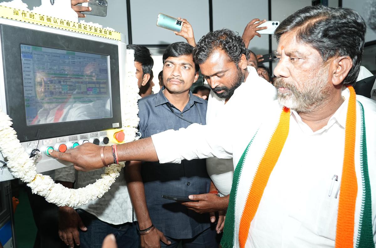 Deputy CM M. Bhatti Vikramarka switching on a wing of a solar panel production unit on the outskirts of Hyderabad on Friday.