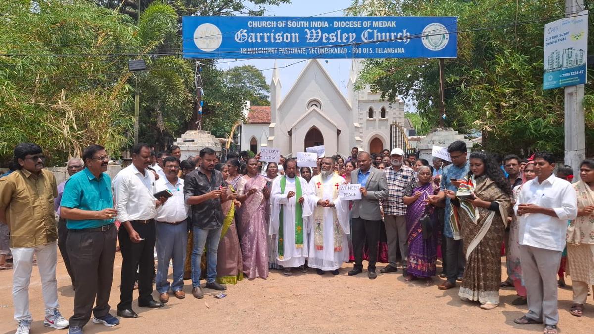 CSI Garrison Wesley Church, Trimulgherry, held a silent candle-light rally outside the church entrance.