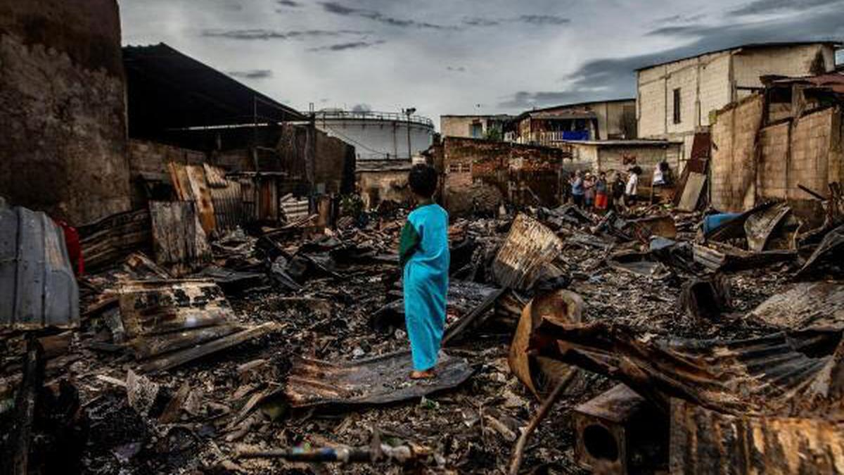 Indonesia fuel depot fire kills 18, over dozen missing