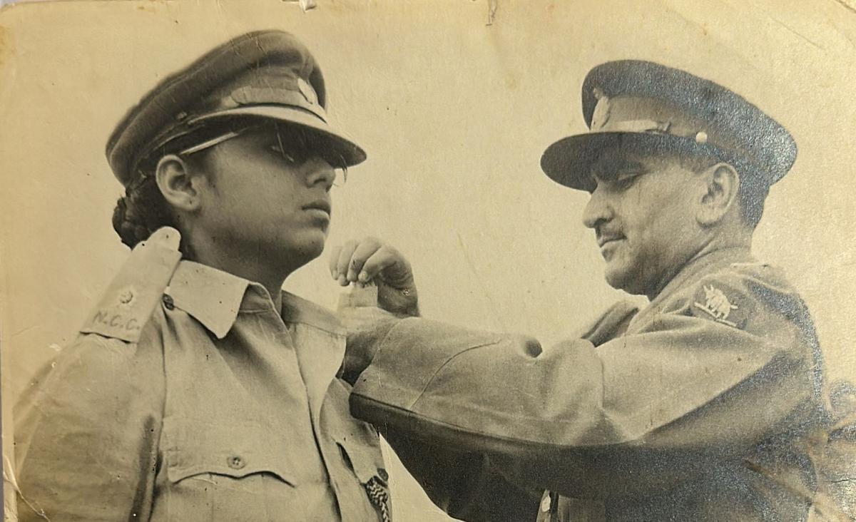 Dr. Neela being pipped as 2nd Lieutenant in the NCC in 1958.