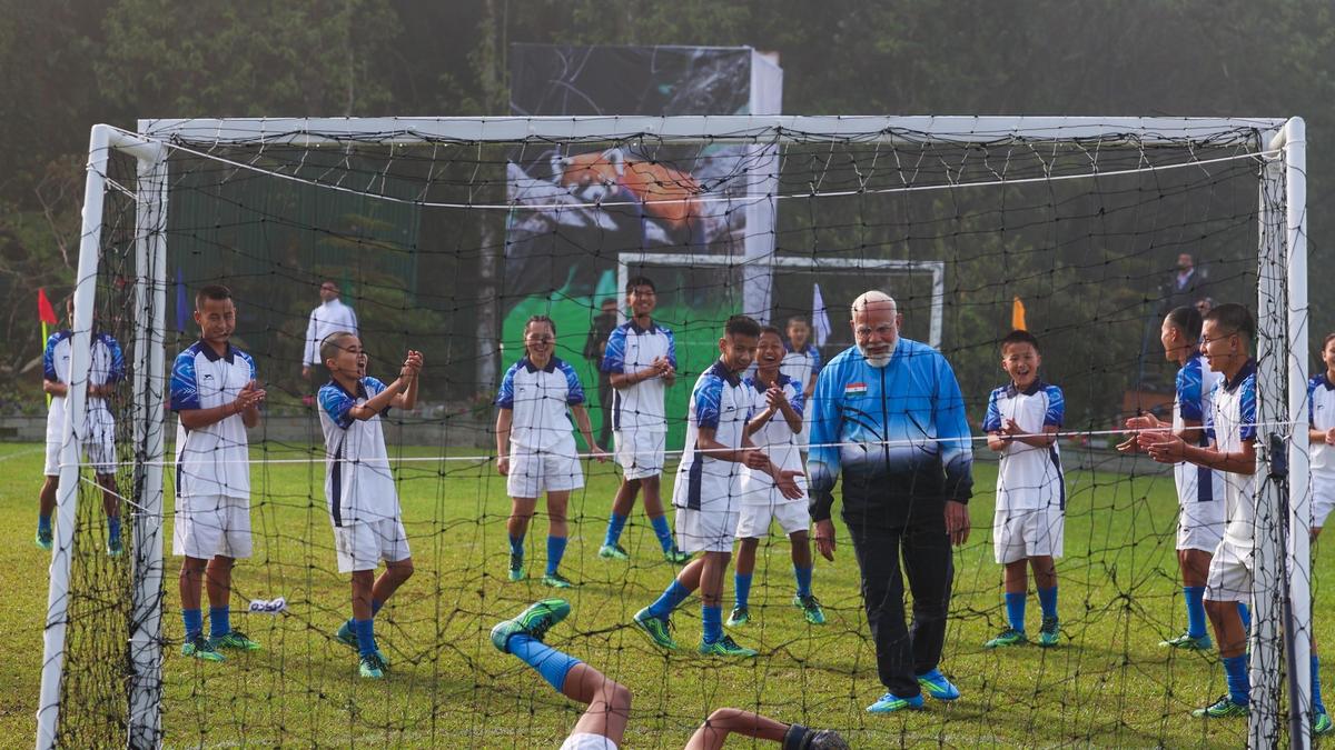 PM Modi plays football with boys, girls in Sikkim