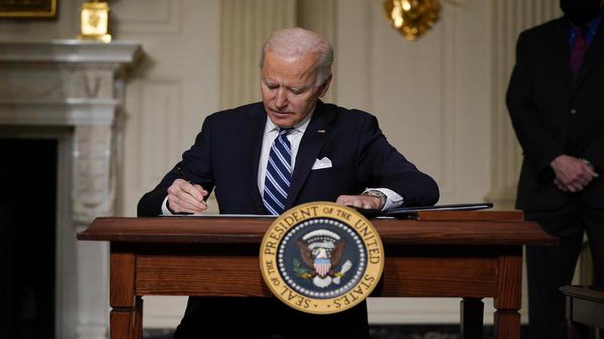 Joe Biden revokes Trump’s immigrant visa ban